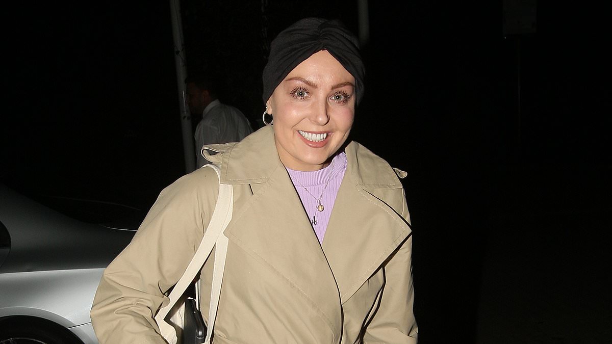 Amy Dowden beams as she arrives at Strictly hotel to meet her friends